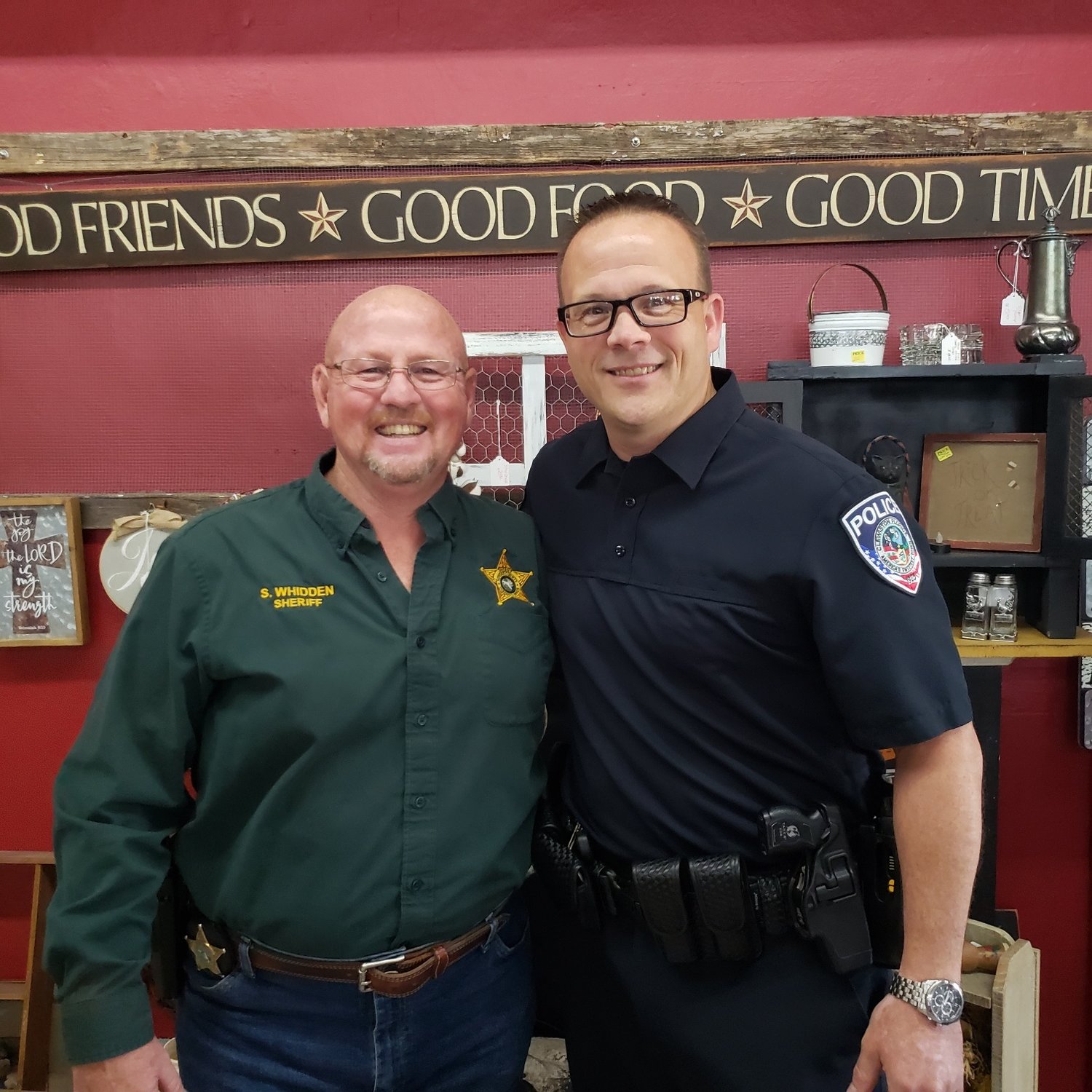 Hendry County Sheriff Steve Widden (left) attended the first "Coffee with the Chief" event, hosted by Clewiston Police Interim Chief Thomas Lewis (right) at Common Grounds Coffee Shop Sept. 22. The Clewiston Chamber of Commerce coordinated the event.